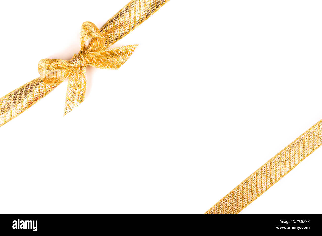Golden bow and Ribbon isolated on white background Stock Photo - Alamy