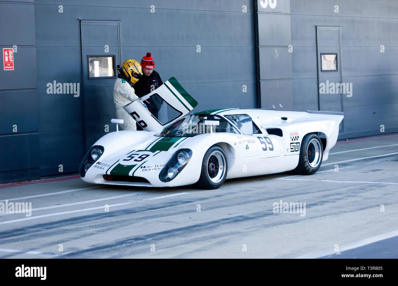 Robert Beebee  with his White, Lola T70 MkIIIB, outside the International Pit Garages, during the 2019 Silverstone Classic Media Day Stock Photo