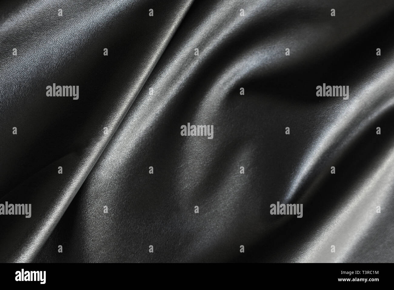Shiny, silky and smooth surface of black fabric background Stock Photo
