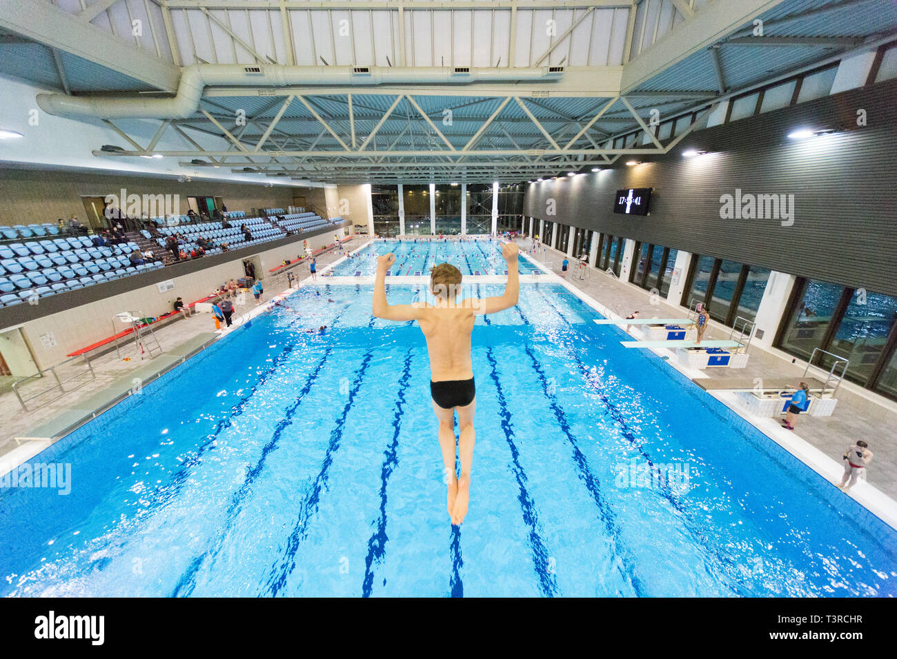 Indoor Swimming Pool With Diving Board High Resolution Stock