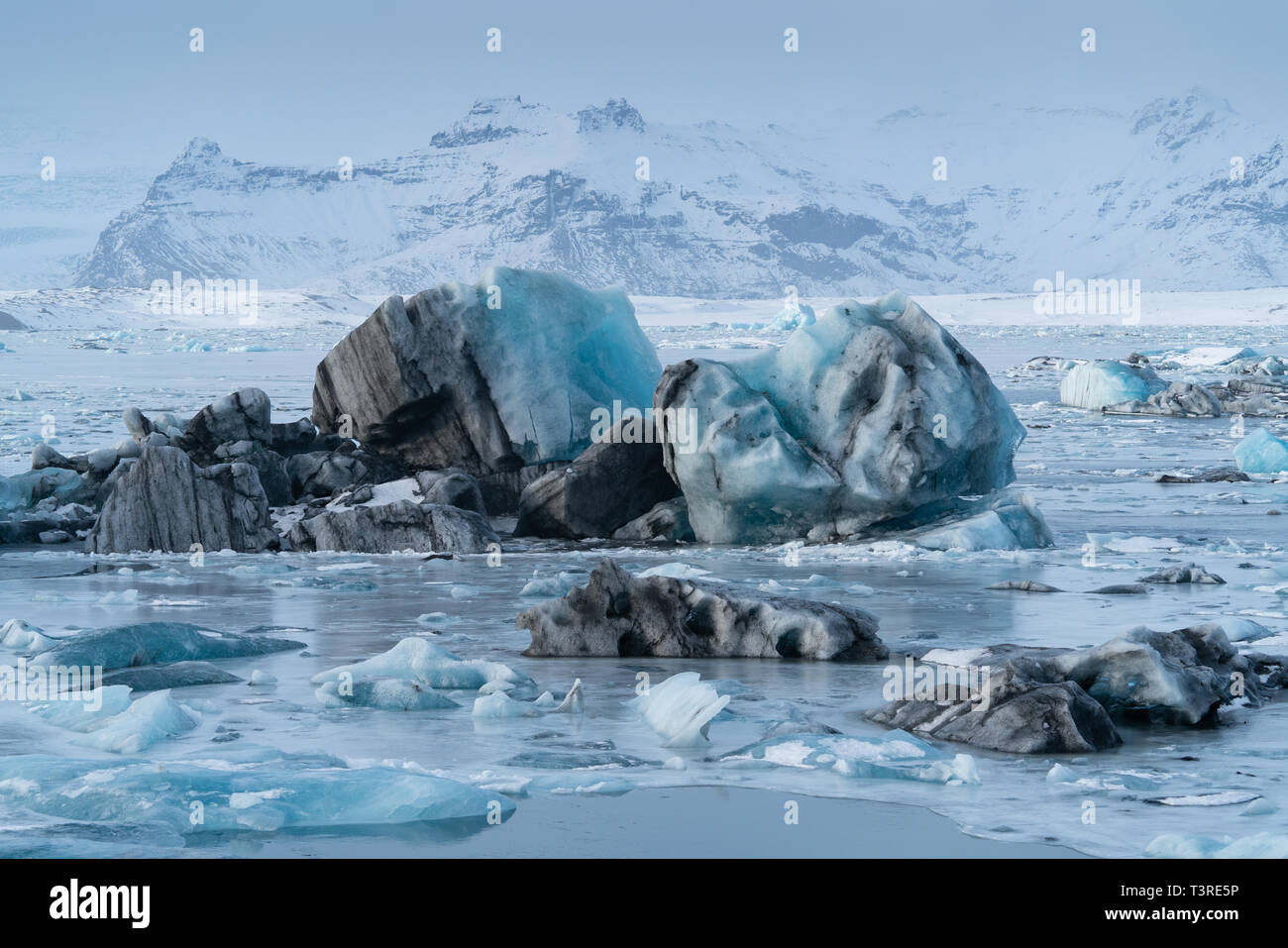 Panoramic view of the glacier lagoon Joekulsarlon with icebergs and in the background the glacier, winter in Iceland, Europe Stock Photo