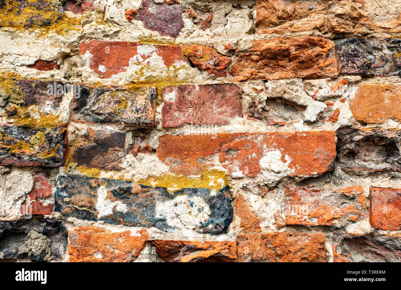 Grunge red brick wall as background texture. Bricks masonry Stock Photo