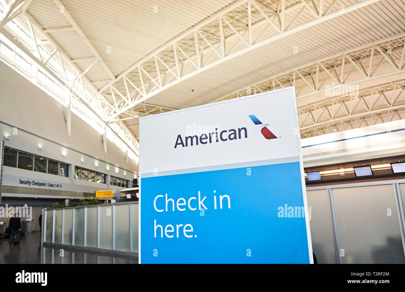 JFK airport American Airlines terminal 8 Check in sign Stock Photo