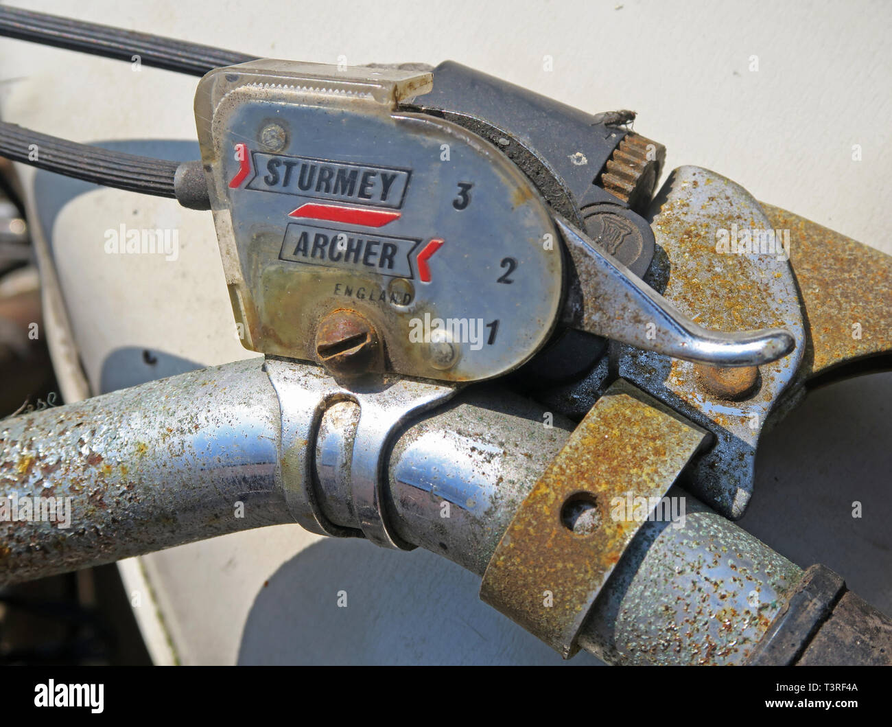 Rusting 1970s Sturmey Archer three speed gear changer on a bicycle, in England Stock Photo