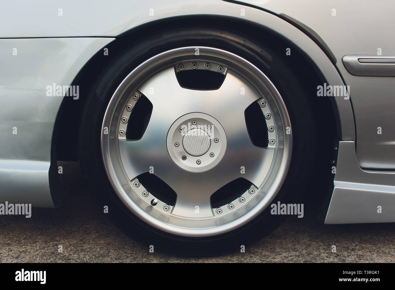 the wheel of a car with a cast disk Stock Photo - Alamy