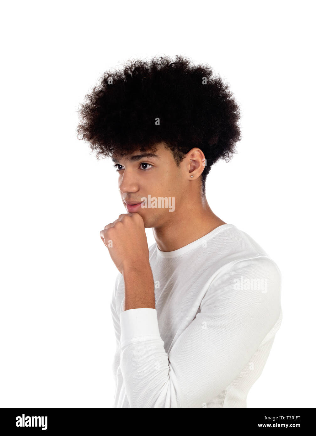 Pensive teenager boy wiht afro hairstyle isolate on a white background  Stock Photo - Alamy