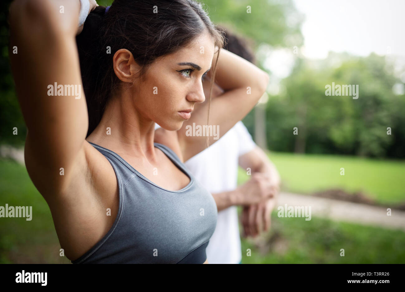 Happy couple running and jogging together outdoor Stock Photo - Alamy