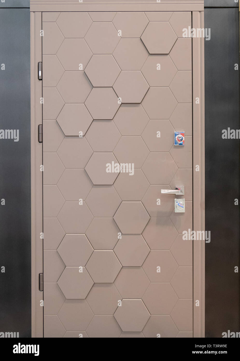 Modern Entrance Front Door With Hexagon Cell Pattern Stock