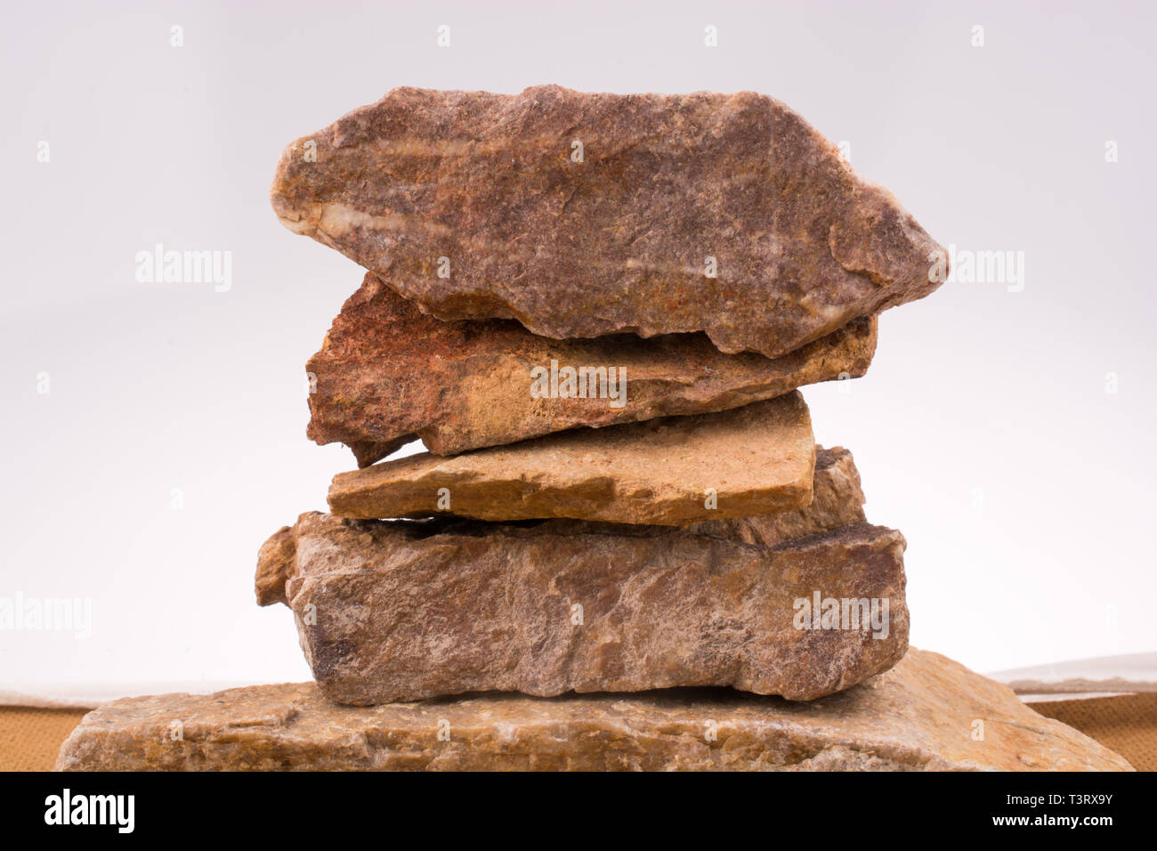 Rocks overlapped on a white background Stock Photo - Alamy