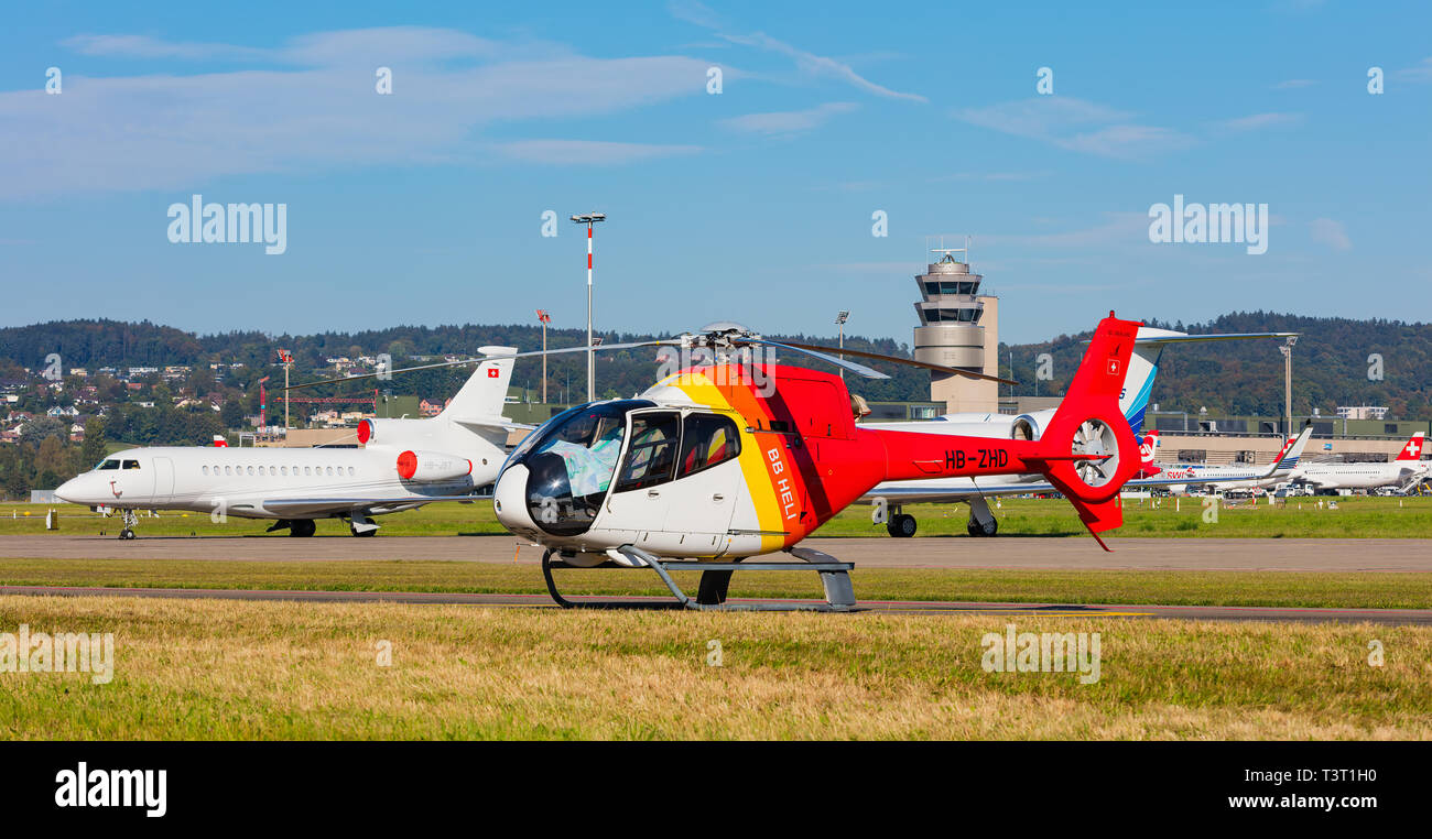 A Eurocopter EC 120B Colibri helicopter at Zurich airport Stock Photo