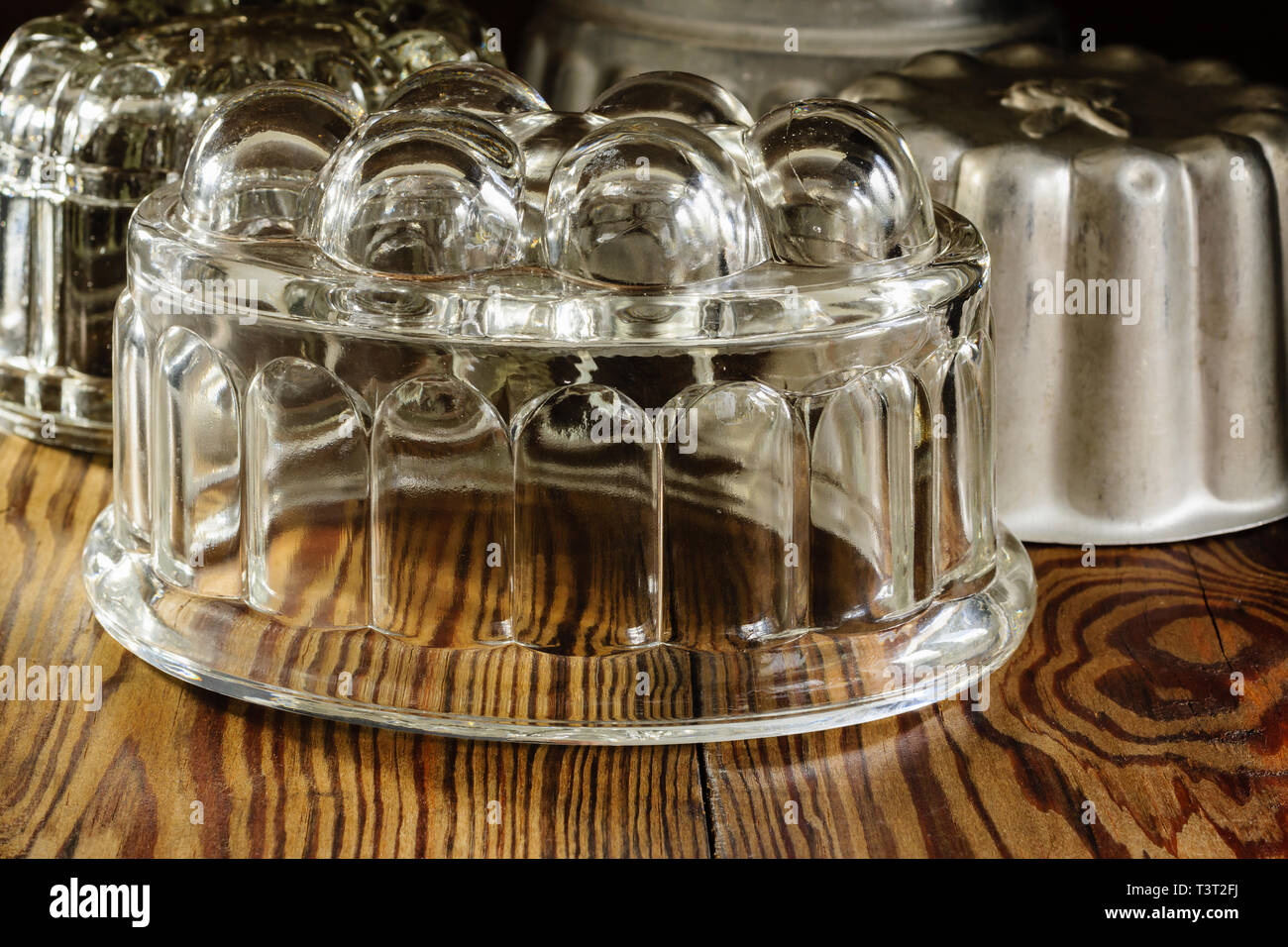 Old fashioned glass and aluminum jelly or blancmange moulds for making