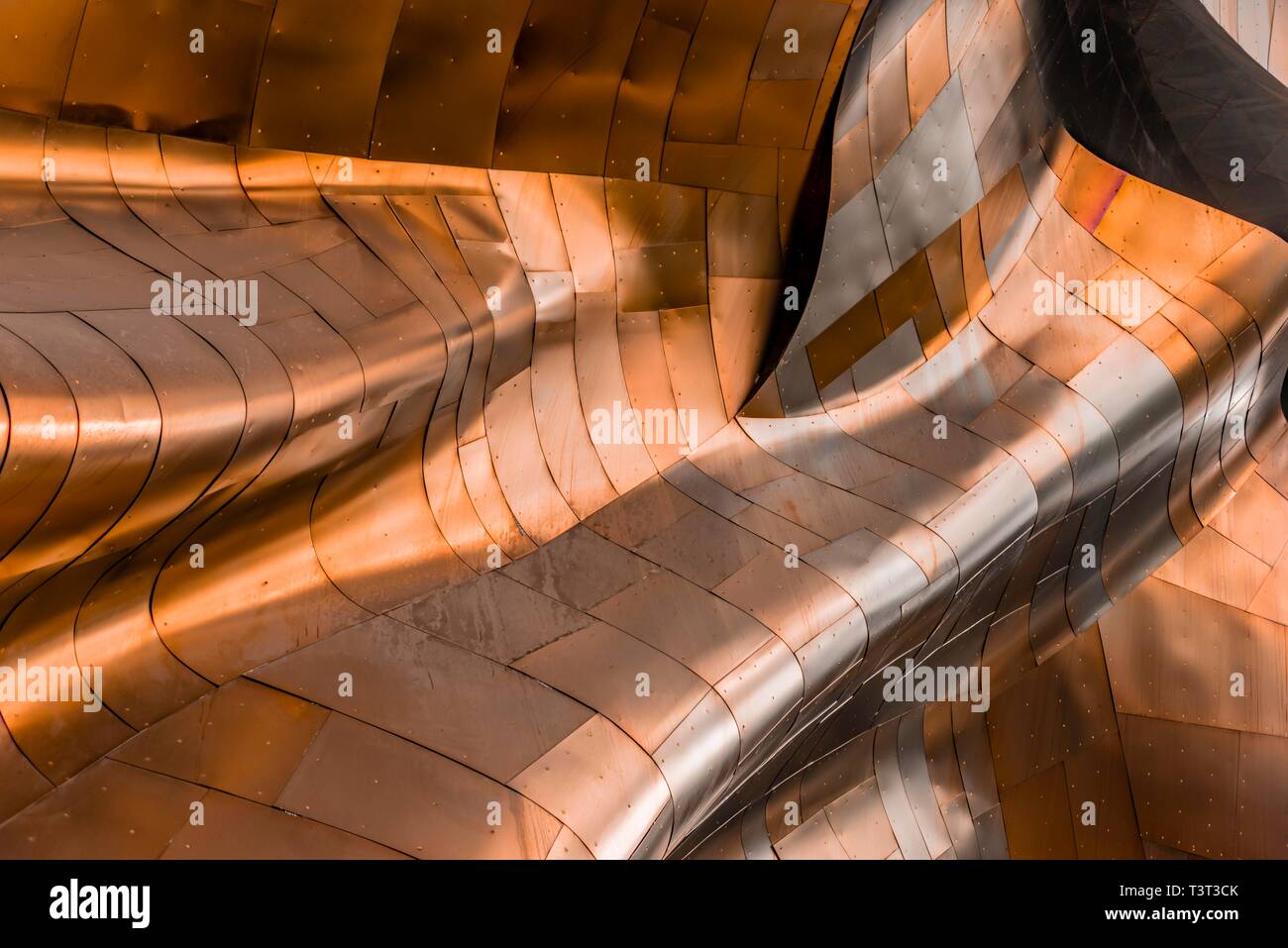 Copper coloured curved facade of the Museum of Pop Culture, MoPOP, detail, modern architecture, architect Frank Gehry, Washington, USA Stock Photo