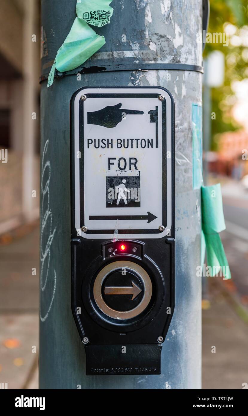 Push button button, push for green at a traffic light, pedestrian traffic light, Washington, USA Stock Photo