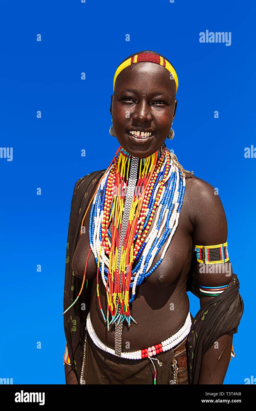 Woman with many pearl necklaces as necklace, tribe of the Erbore, Mago National Park, region of the southern nations nationalities and peoples Stock Photo
