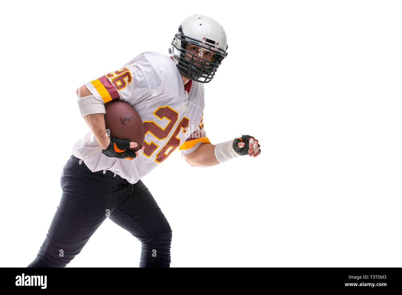 Bearded American football player in ation. Stock Photo