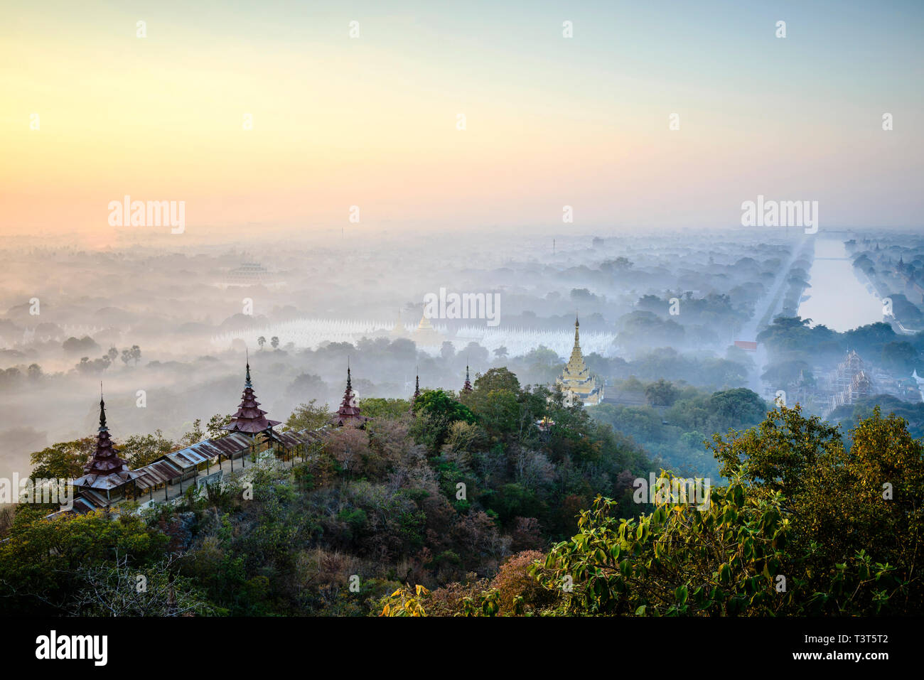 Aerial view of towers in misty landscape Stock Photo - Alamy