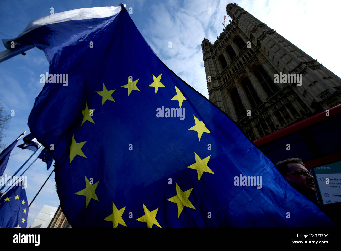 The EU flag outside the Houses of Parliament in Westminster, after the European Council in Brussels agreed to a second extension to the Brexit process. Stock Photo