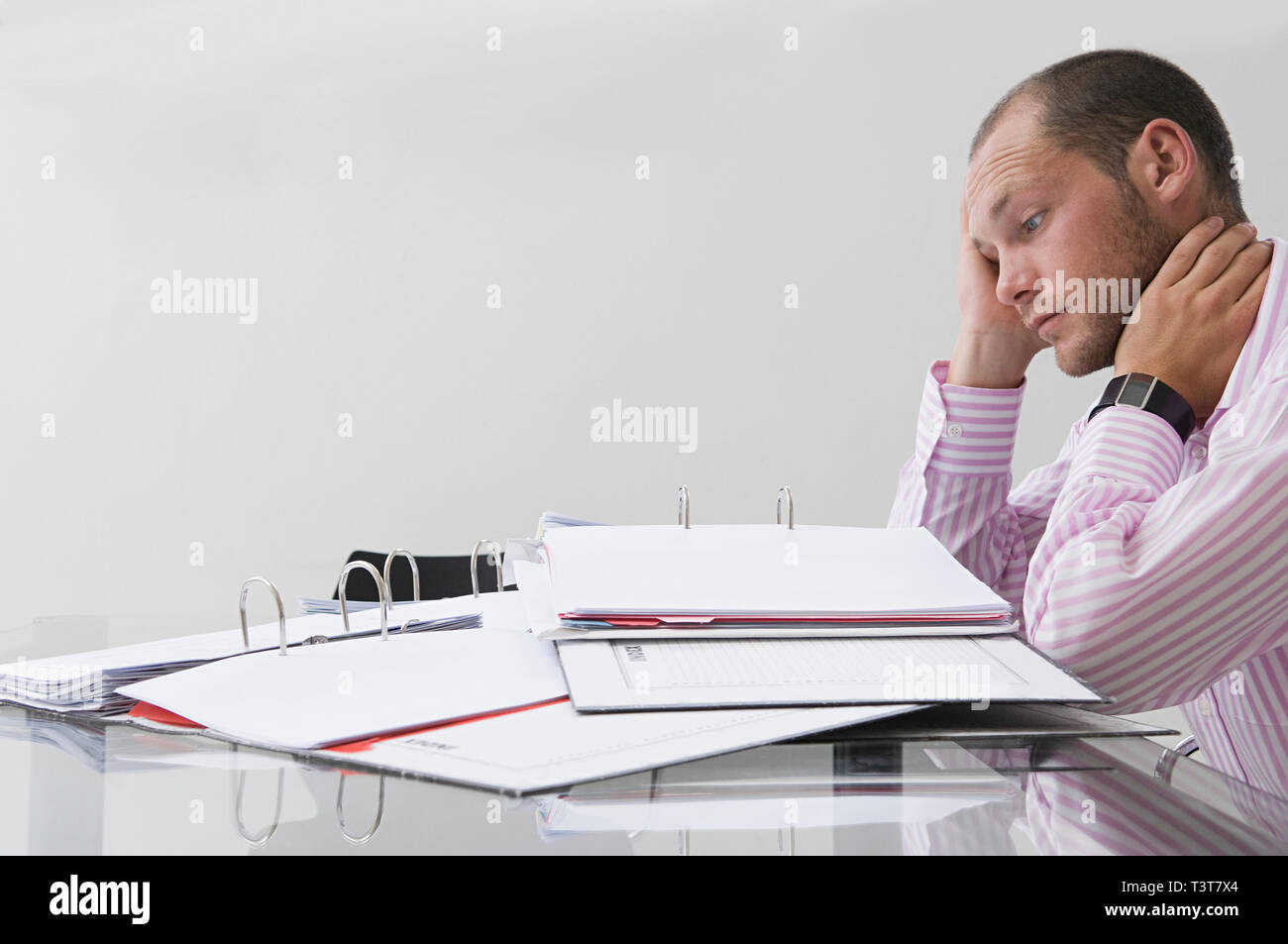 Caucasian businessman working in office Stock Photo
