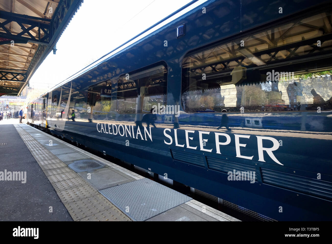 A Caledonian Sleeper train at Edinburgh Waverley Station. Stock Photo