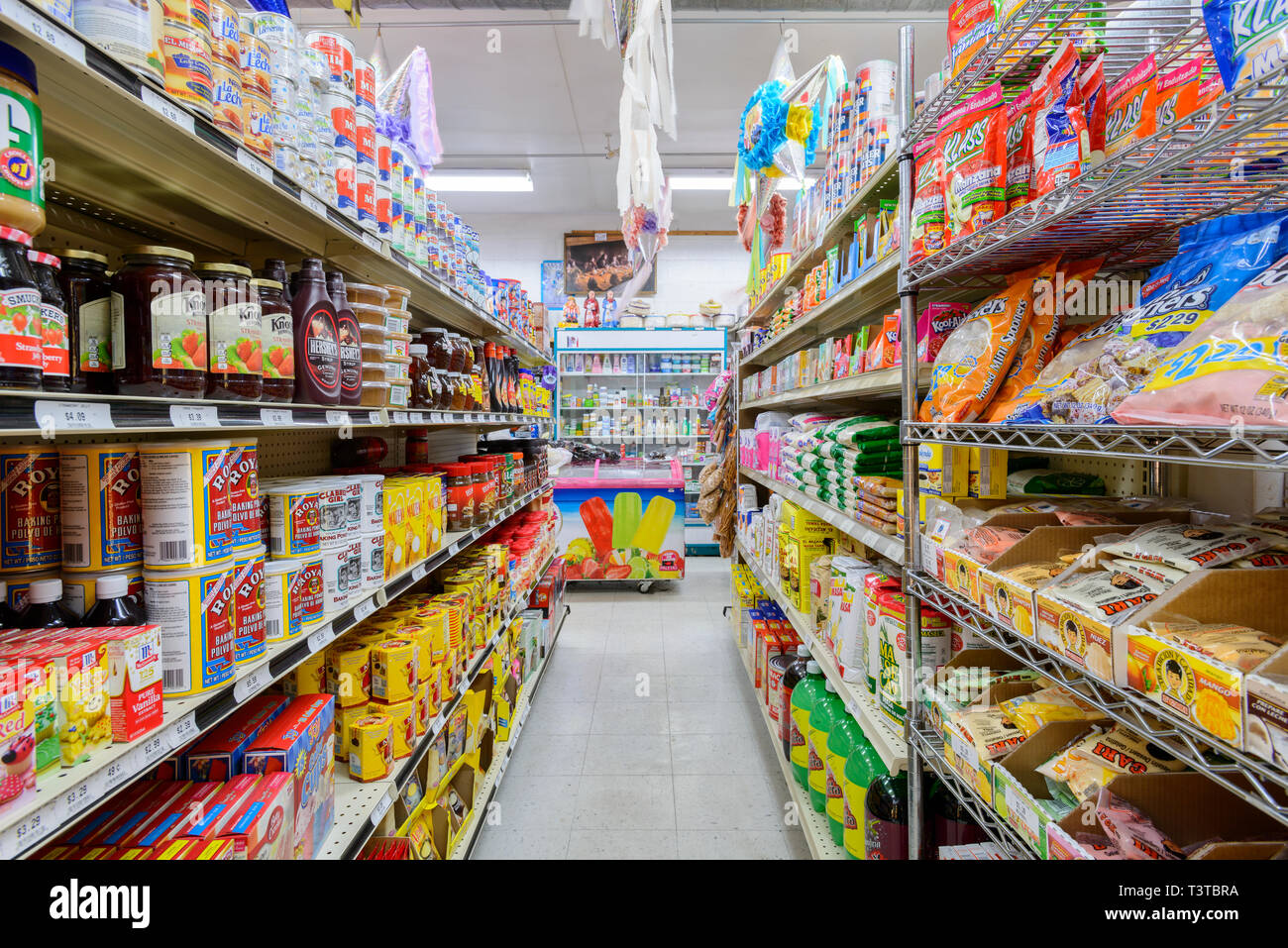 Food on shelves of grocery store Stock Photo Alamy