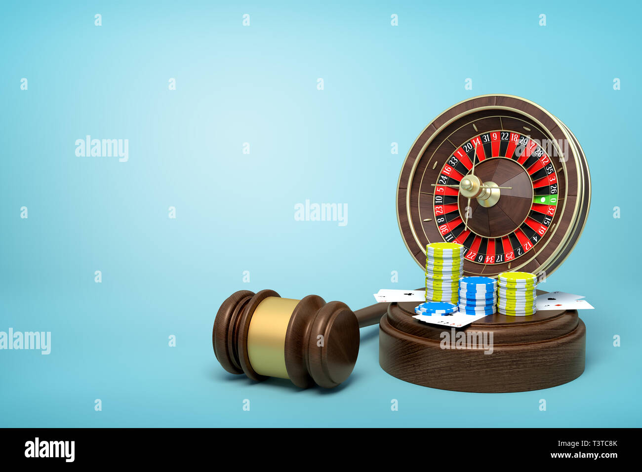 3d rendering of casino roulette, chips and playing cards on round wooden block and brown wooden gavel on blue background Stock Photo