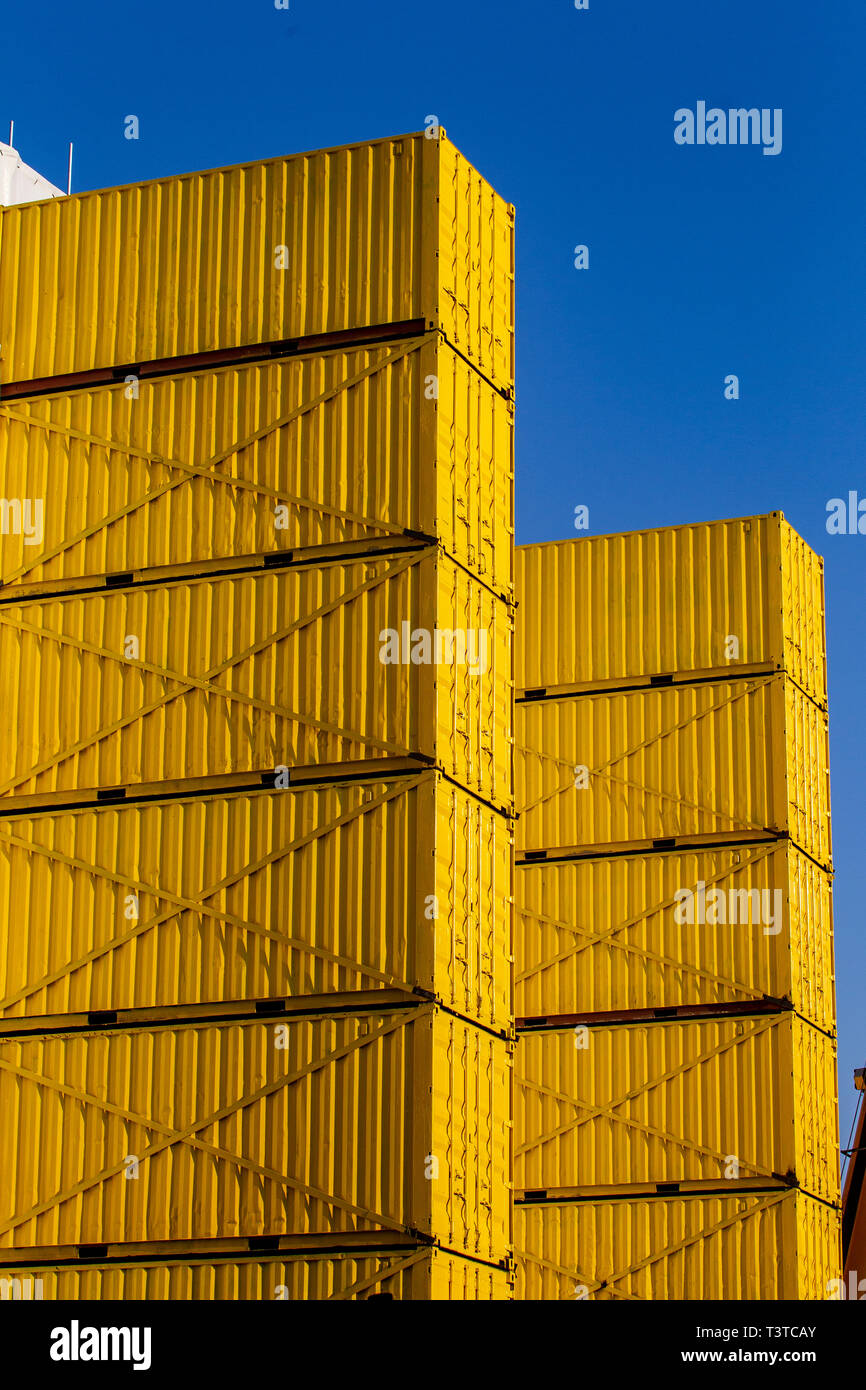 Belfast 11th April 2019. Two columns of Yellow Ship containers Stacked ...