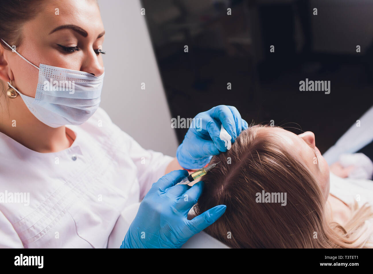 Platelet rich plasma injection procedure. Hair growth stimulation. PRP therapy process Stock