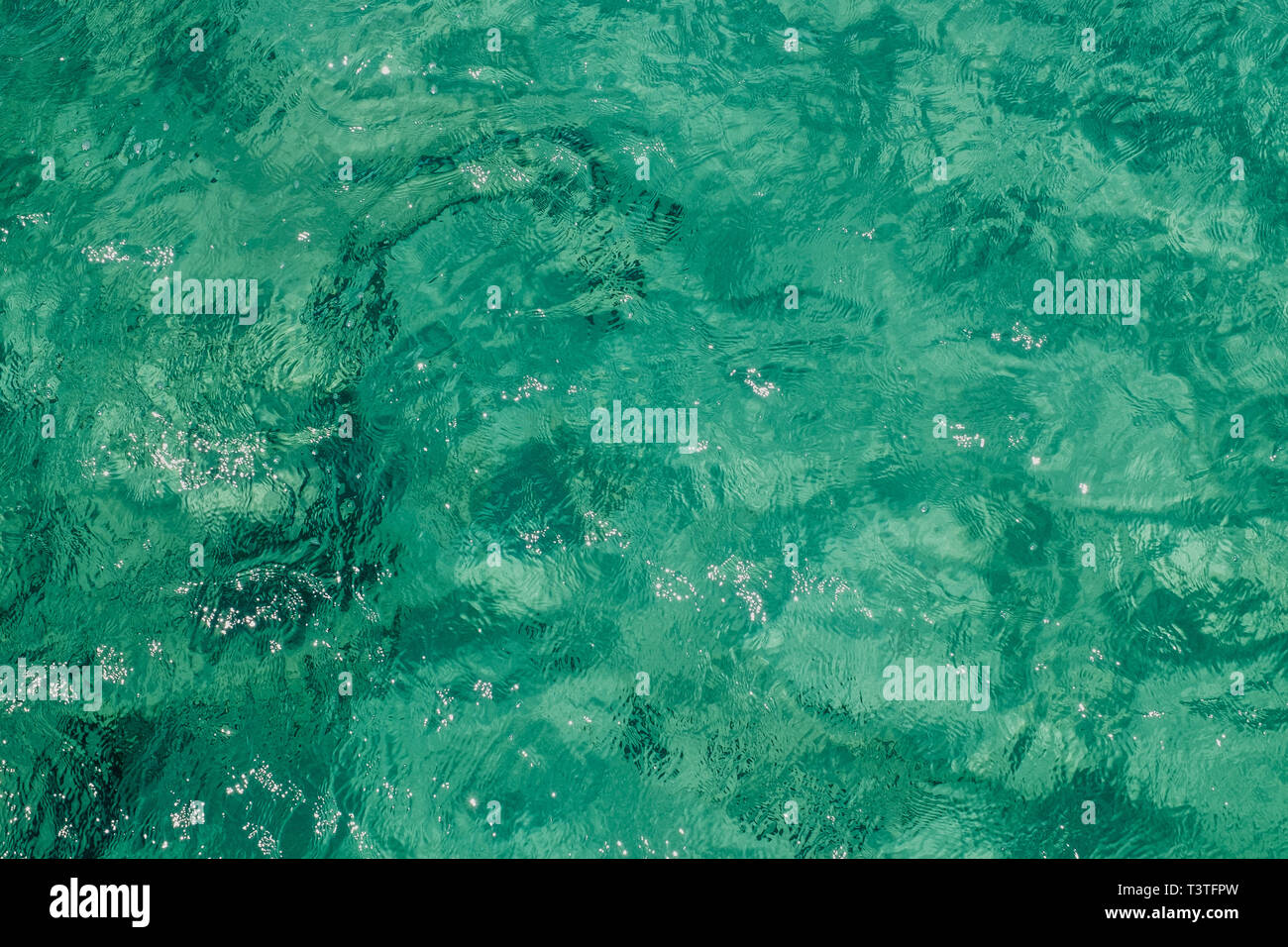 Emerald clean transparet sea water texture. Stock Photo