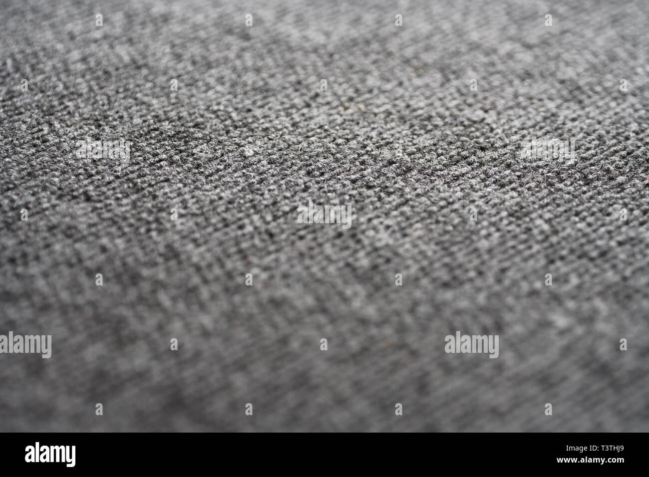 Texture of the Gray Nylon Carpet. Textile Background with Copy Space