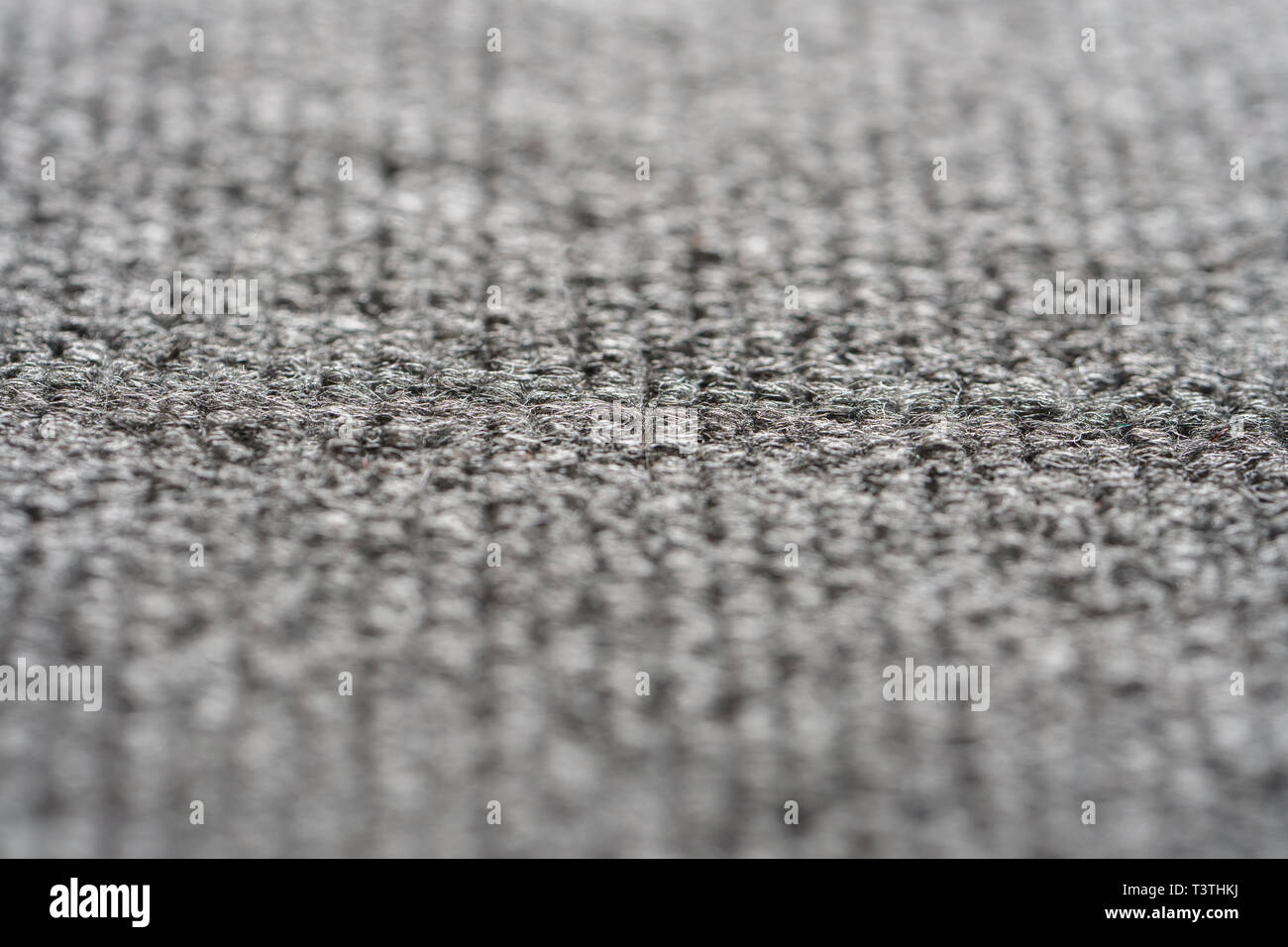Texture of the Gray Nylon Carpet. Textile Background with Copy Space