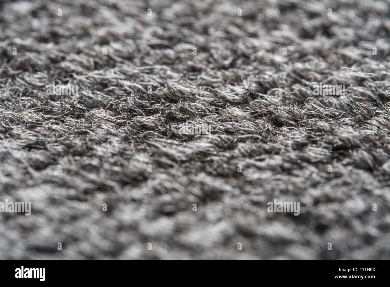 Texture of the Gray Nylon Carpet. Textile Background with Copy Space