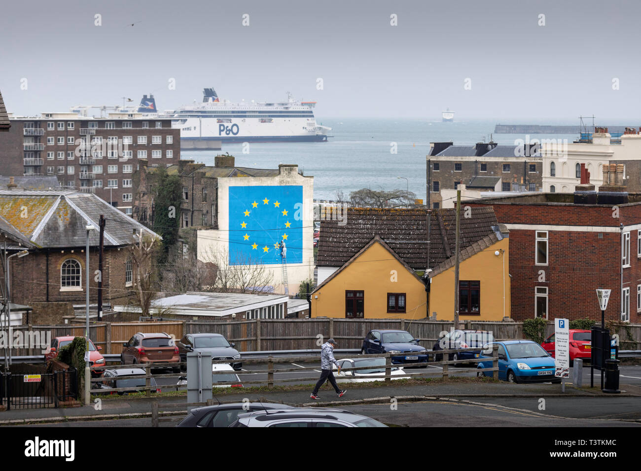 What next for Brexit?? A ferry approaches the Port of Dover where Banksy's famous Brexit mural stands large on the side of a derelict building.   Pict Stock Photo