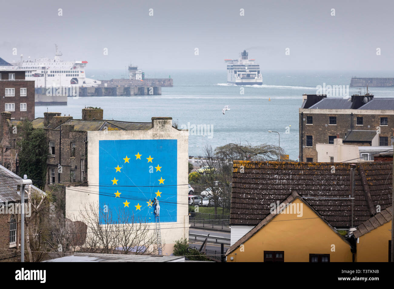 What next for Brexit?? A ferry departs the Port of Dover where Banksy's famous Brexit mural stands large on the side of a derelict building.   Picture Stock Photo