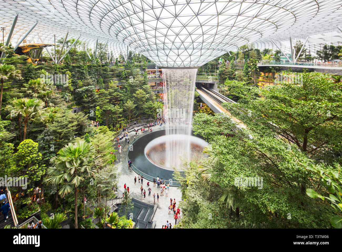 Indoor waterfall at Jewel Changi Airport during the day, Singapore Stock Photo