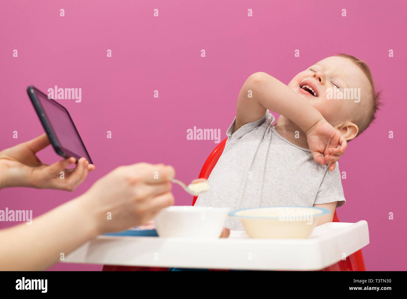 Little boy does not want to eat Mashed potatoes. Child eats breakfast