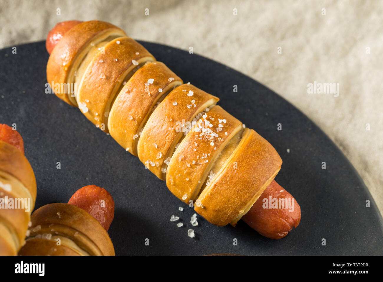 Homemade Pretzel Wrapped Hot Dog with Ground Mustard Stock Photo Alamy