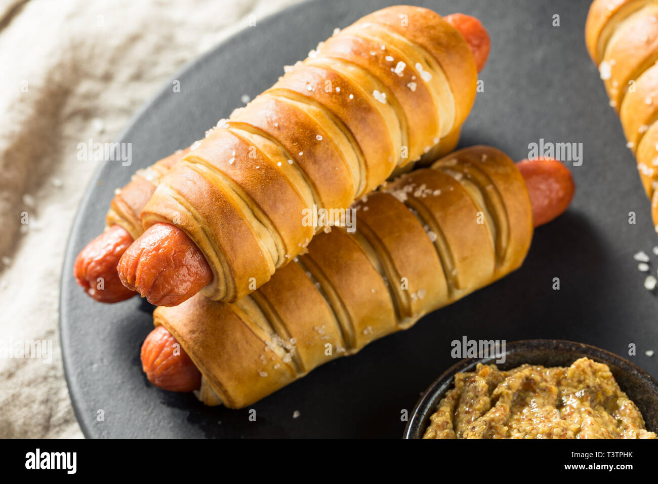 Homemade Pretzel Wrapped Hot Dog with Ground Mustard Stock Photo Alamy