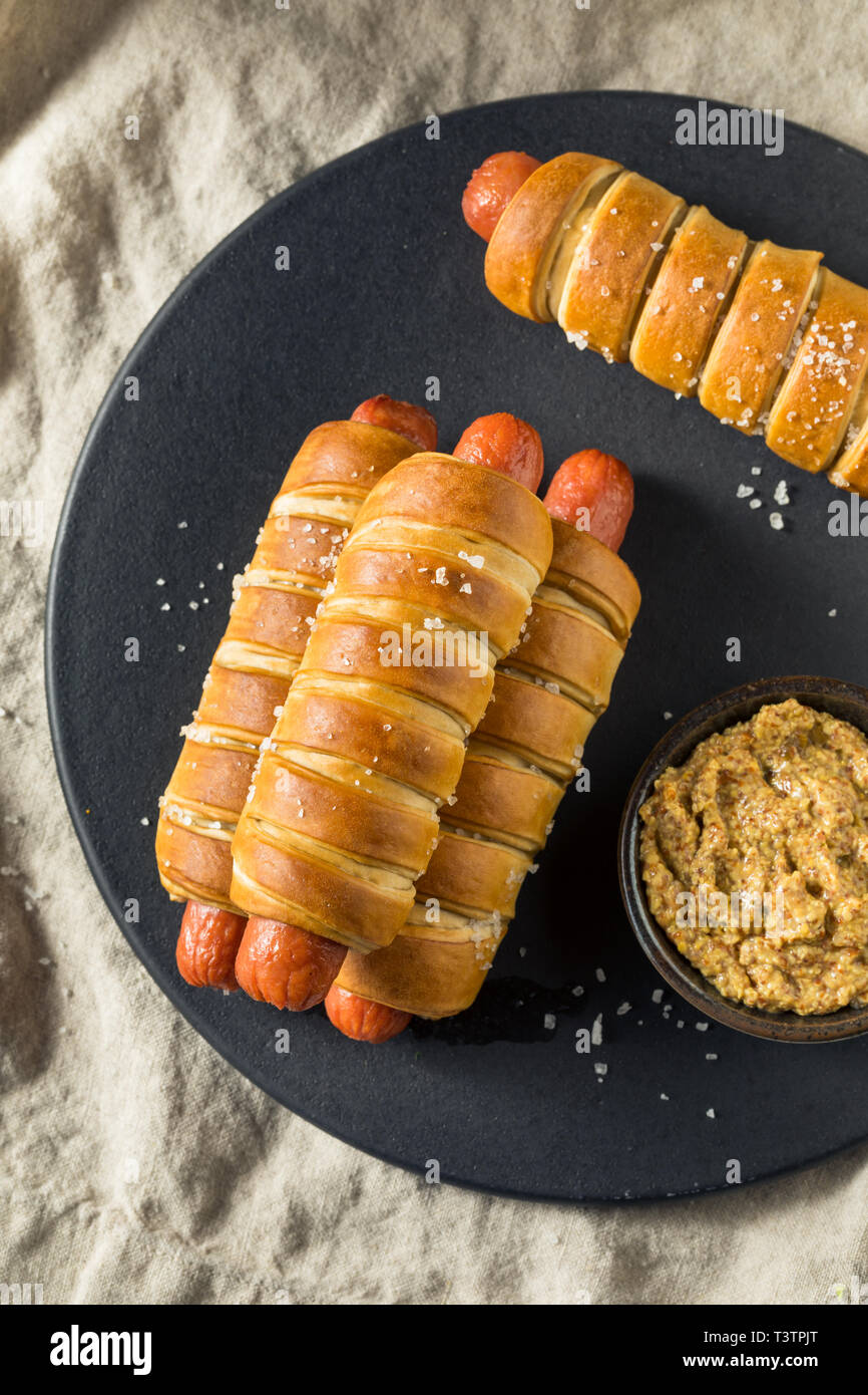 Homemade Pretzel Wrapped Hot Dog with Ground Mustard Stock Photo Alamy