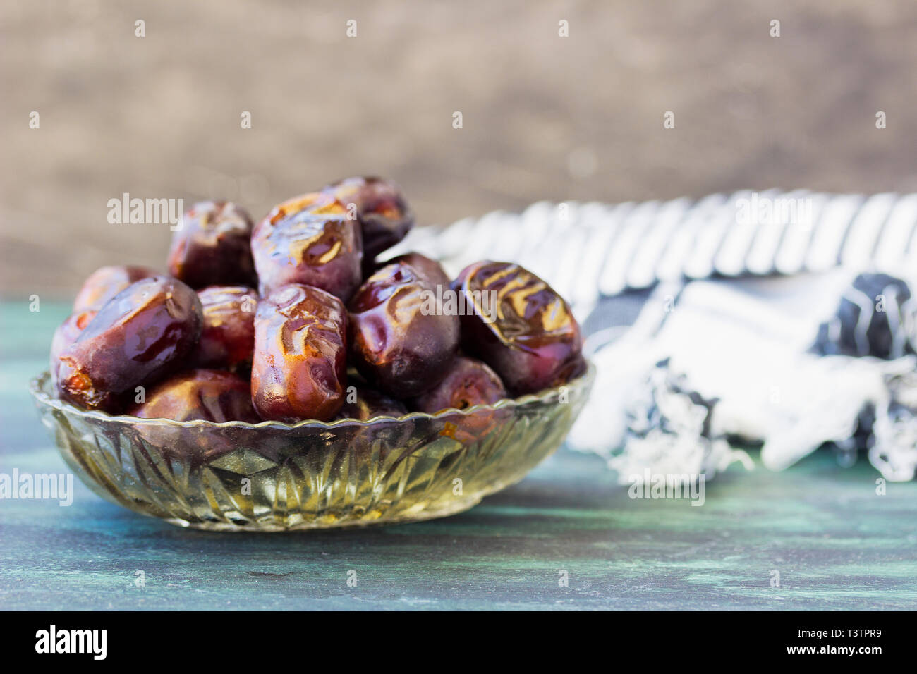 Bowl of dried dates Stock Photo