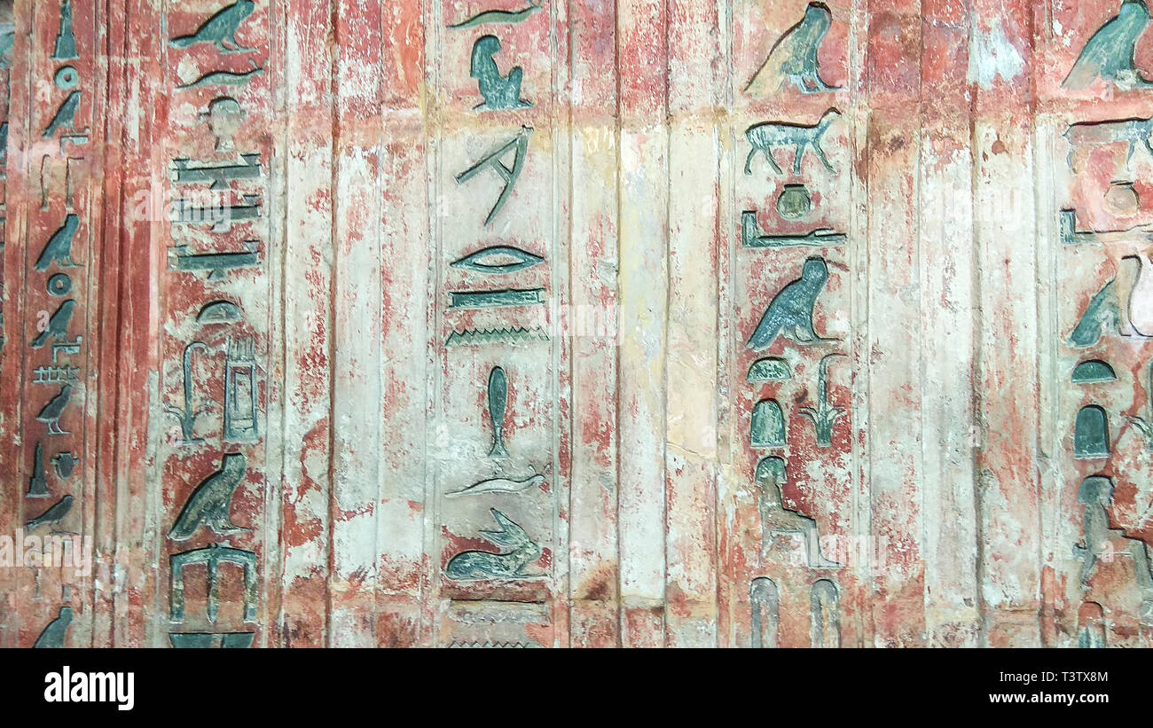 Egyptian Hieroglyphic painted on the old wall Stock Photo