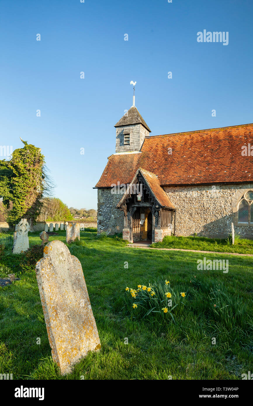 Spring morning at St Mary's church in Binsted village, West Sussex, England. Stock Photo