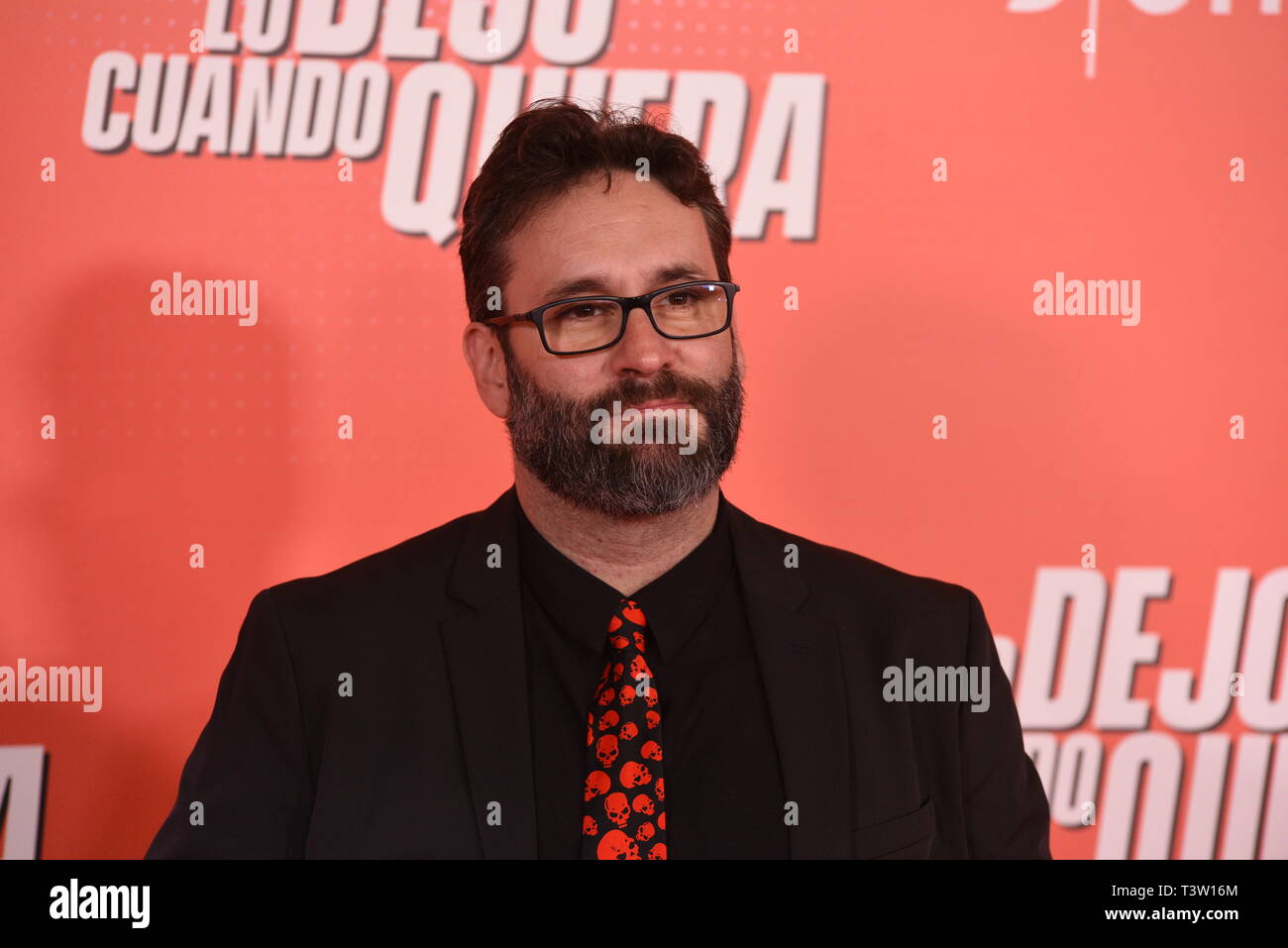 Spanish Director Carlos Theron seen posing for media as he arrives for the 'Lo Dejo Cuando Quiera' premiere at Capitol Cinema in Madrid. Stock Photo