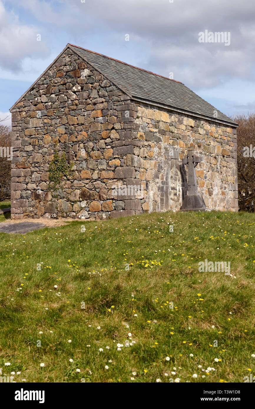 Stone house with Celtic cross, Spiddal, Galway, Ireland Stock Photo