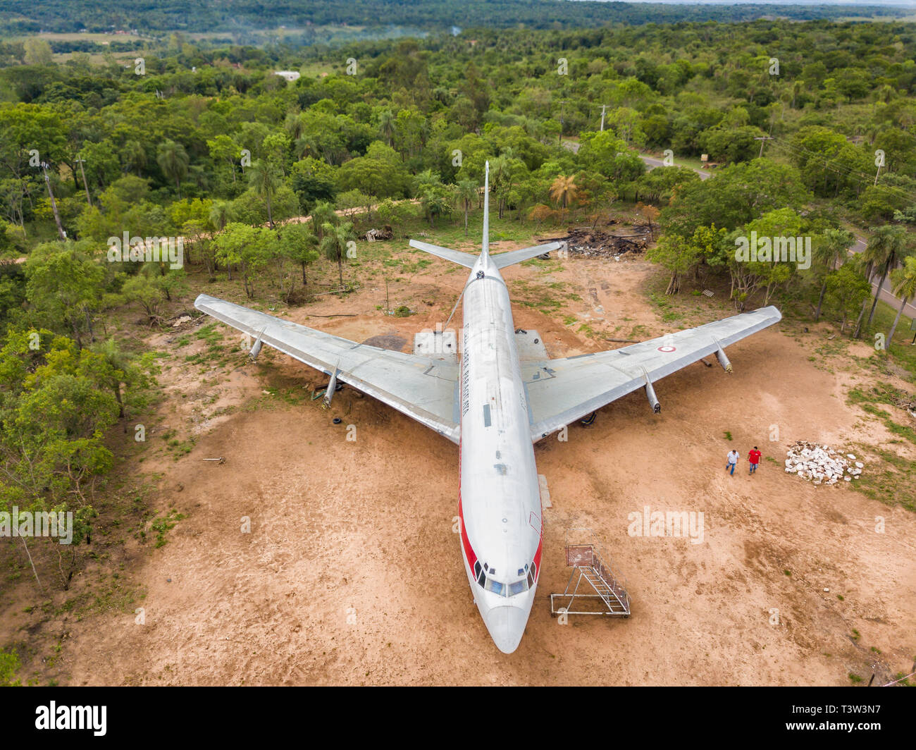 Loma Grande, Paraguay - November 07, 2017: Aerial view of a discarded airplane on a private lot. The plots around the plane are for sale. Stock Photo