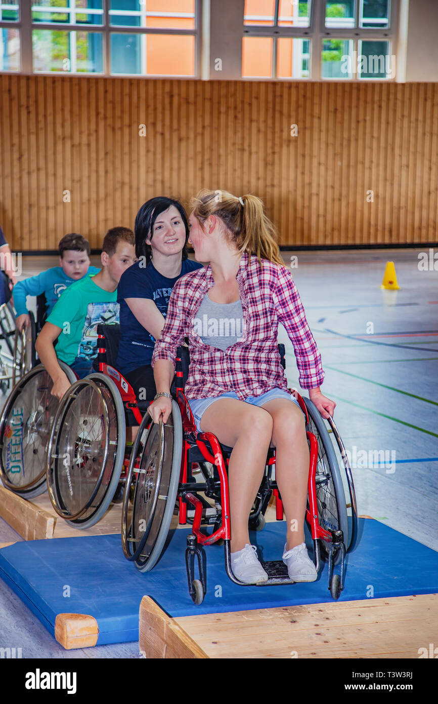 Gummersbach, Germany - May 18, 2014: Disabled teenagers in wheelchair sports in the sports hall Stock Photo