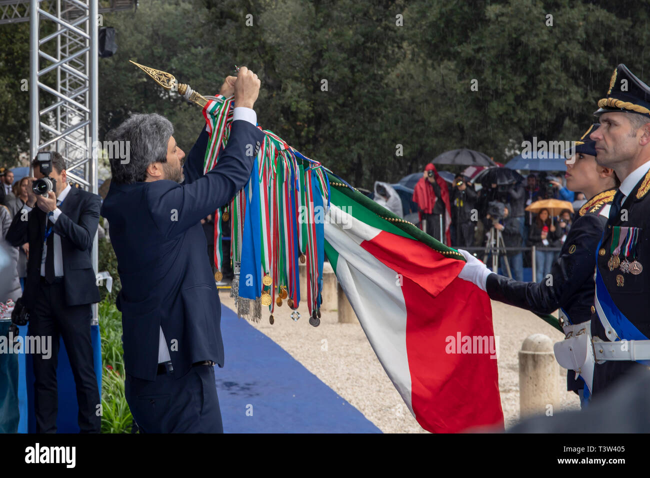 Rome, Italy - April 10, 2019: The president of the Chamber of Deputies Roberto Fico honors the Italian flag during the celebrations for the 167th anni Stock Photo
