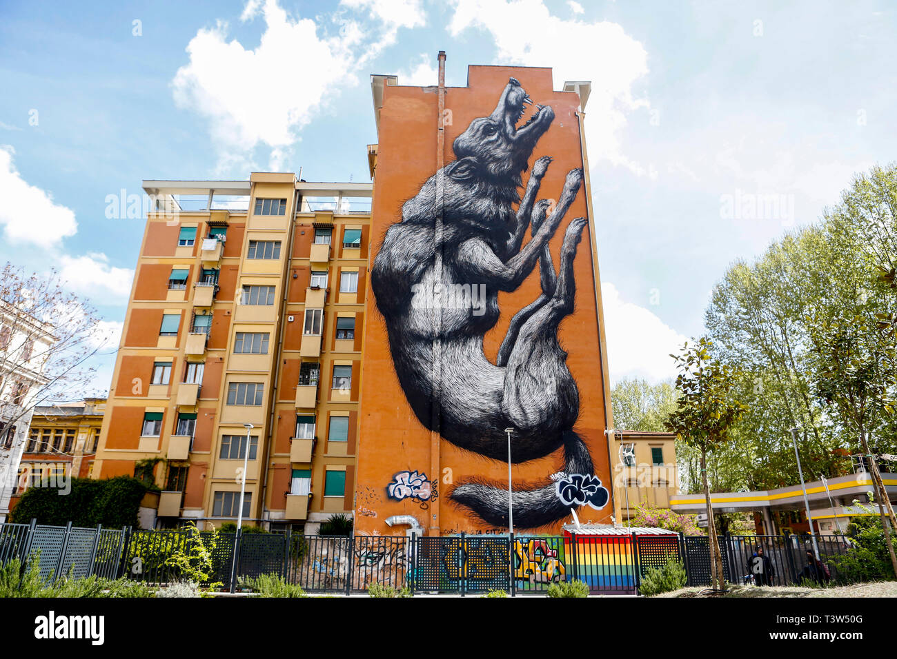 A 30 meters high mural depicting a jumping wolf, painted by the Belgian street-artis Roa, in Testaccio neighborhood in Rome, Italy. Stock Photo