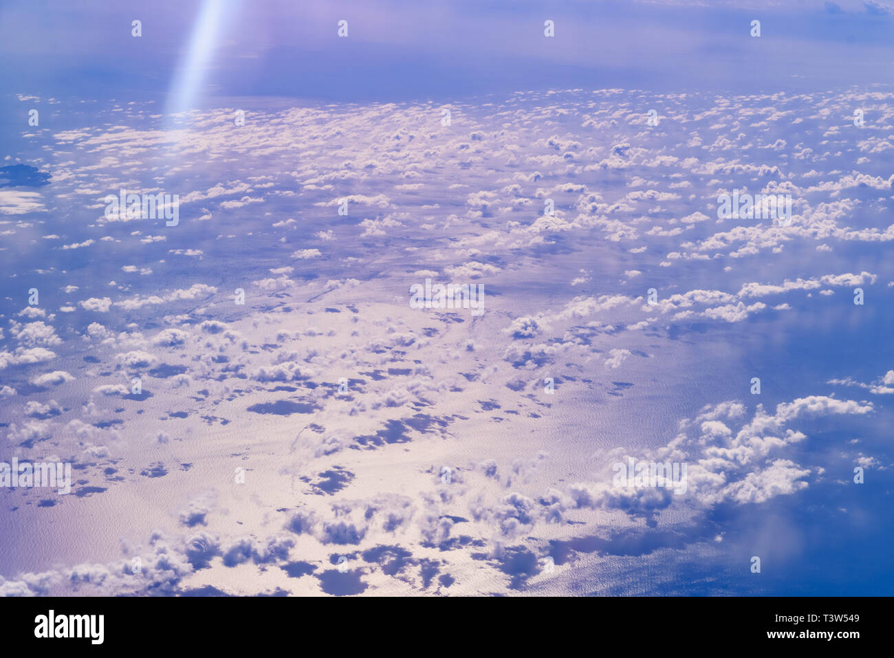 Sea of blue and white clouds seen from above Stock Photo - Alamy