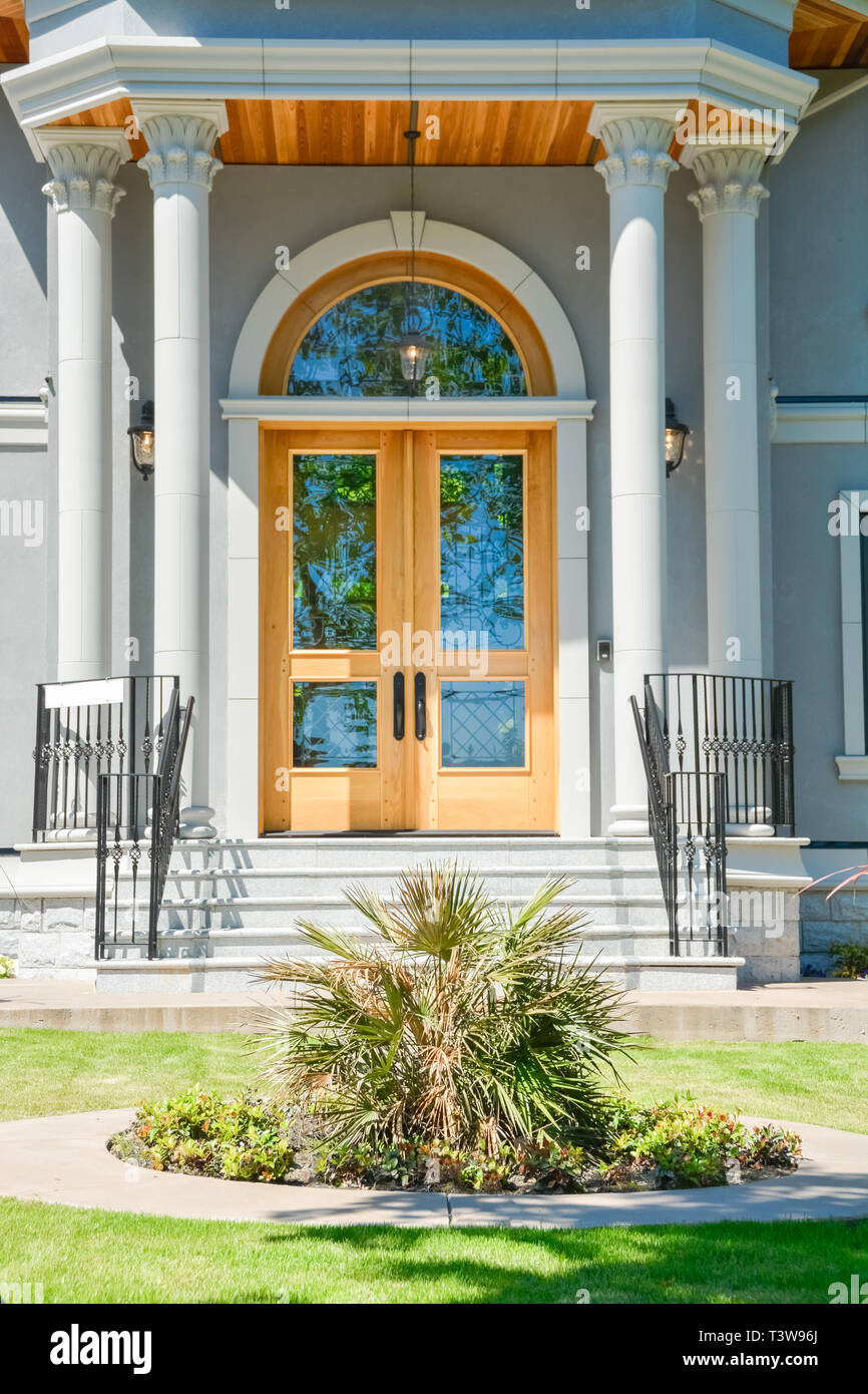 Entrance of luxury family residential house with doorsteps in front