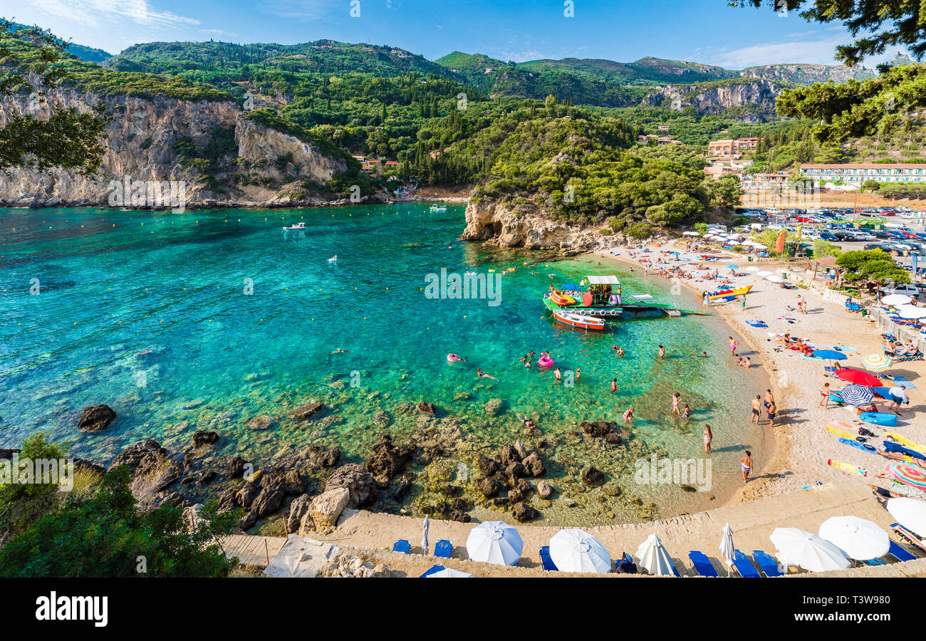 Beautiful beach and boat in Paleokastritsa, Corfu island, Greece Stock Photo